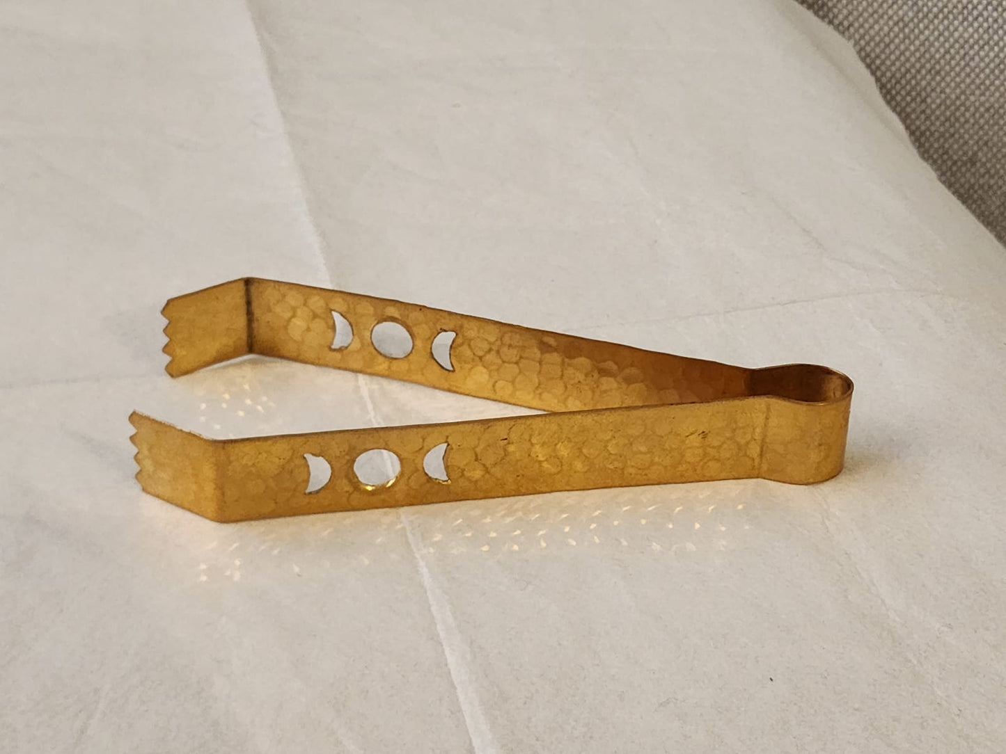 Moonlit Brass Tong: Hand-Hammered Heritage from Moradabad